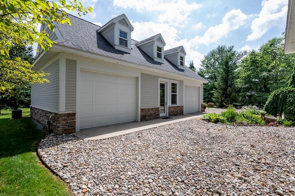 Stunning Lake Home in Grass Lake, MI Reinhart Reinhart